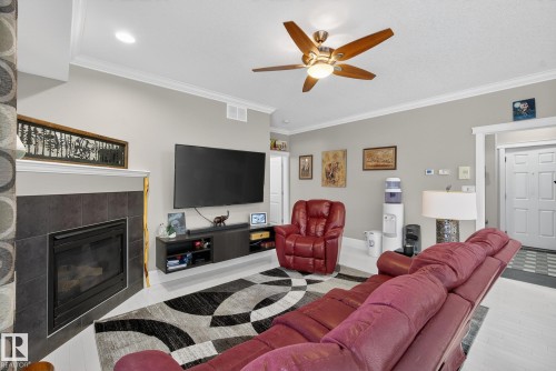63 7293 South Terwillegar Drive, Edmonton, AB - Indoor Photo Showing Living Room With Fireplace