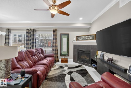 63 7293 South Terwillegar Drive, Edmonton, AB - Indoor Photo Showing Living Room With Fireplace