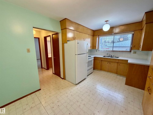 11455 44A Avenue, Edmonton, AB - Indoor Photo Showing Kitchen With Double Sink