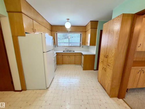 11455 44A Avenue, Edmonton, AB - Indoor Photo Showing Kitchen With Double Sink