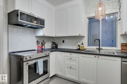 13324 109A Avenue, Edmonton, AB - Indoor Photo Showing Kitchen With Stainless Steel Kitchen With Double Sink