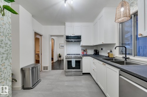 13324 109A Avenue, Edmonton, AB - Indoor Photo Showing Kitchen With Stainless Steel Kitchen With Double Sink