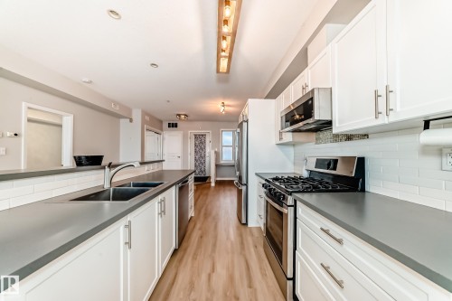 115 9507 101 Avenue, Edmonton, AB - Indoor Photo Showing Kitchen With Double Sink With Upgraded Kitchen