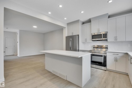 8931 Elves Loop, Edmonton, AB - Indoor Photo Showing Kitchen With Stainless Steel Kitchen With Upgraded Kitchen