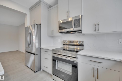 8931 Elves Loop, Edmonton, AB - Indoor Photo Showing Kitchen With Stainless Steel Kitchen With Upgraded Kitchen