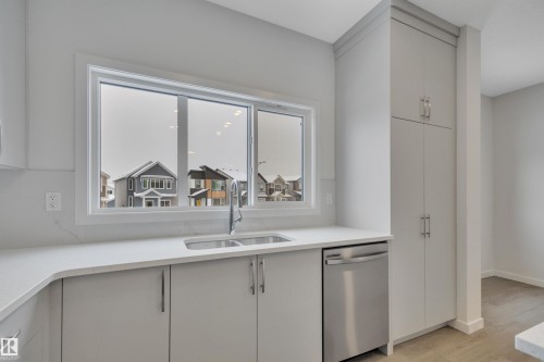 8931 Elves Loop, Edmonton, AB - Indoor Photo Showing Kitchen With Double Sink