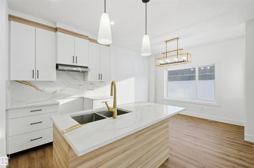 63 Silverstone Drive, Stony Plain, AB - Indoor Photo Showing Kitchen With Double Sink