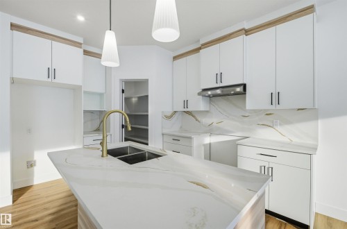 63 Silverstone Drive, Stony Plain, AB - Indoor Photo Showing Kitchen With Double Sink With Upgraded Kitchen