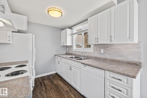 2B Clareview Village, Edmonton, AB - Indoor Photo Showing Kitchen With Double Sink