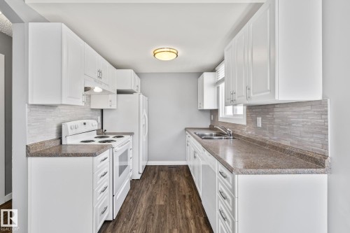2B Clareview Village, Edmonton, AB - Indoor Photo Showing Kitchen With Double Sink
