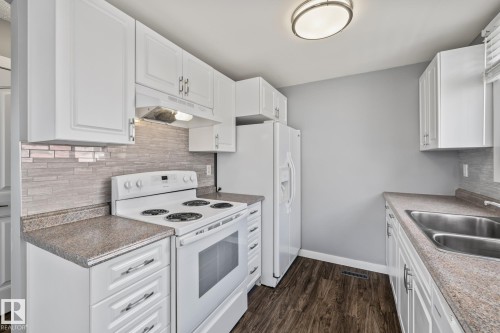 2B Clareview Village, Edmonton, AB - Indoor Photo Showing Kitchen With Double Sink