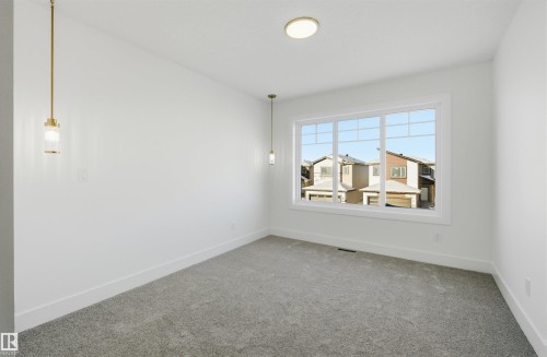 65 Silverstone Drive, Stony Plain, AB - Indoor Photo Showing Other Room