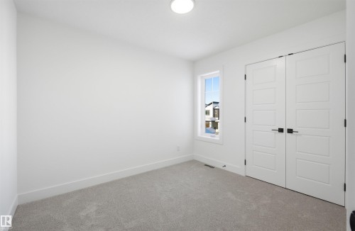 65 Silverstone Drive, Stony Plain, AB - Indoor Photo Showing Other Room