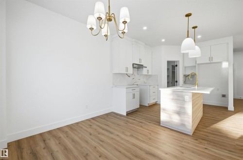 65 Silverstone Drive, Stony Plain, AB - Indoor Photo Showing Kitchen With Upgraded Kitchen