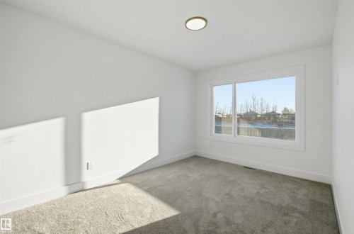65 Silverstone Drive, Stony Plain, AB - Indoor Photo Showing Other Room