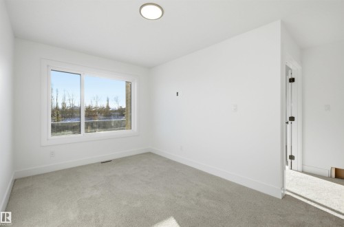 65 Silverstone Drive, Stony Plain, AB - Indoor Photo Showing Other Room