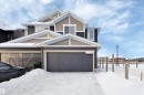 View of front of home with a garage - 5742 Hawthorn Common, Edmonton, AB  - Outdoor 