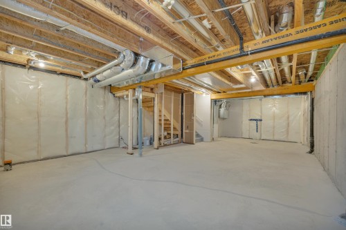 Unfinished below grade area with stairway - 5742 Hawthorn Common, Edmonton, AB - Indoor Photo Showing Basement
