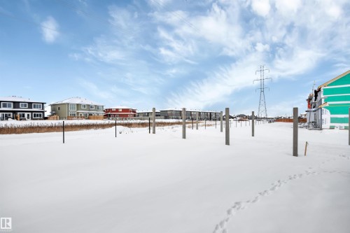 View of yard layered in snow - 5742 Hawthorn Common, Edmonton, AB - Outdoor With View