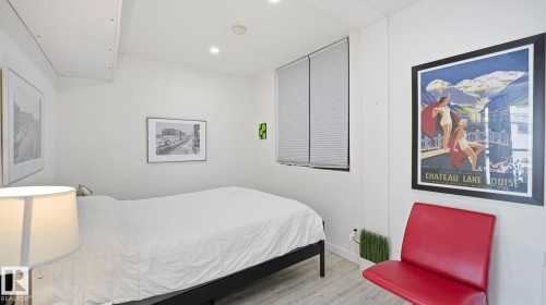 Bedroom featuring wood finished floors - 9831 83 Avenue, Edmonton, AB - Indoor Photo Showing Bedroom