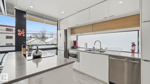 9831 83 Avenue, Edmonton, AB - Indoor Photo Showing Kitchen With Double Sink