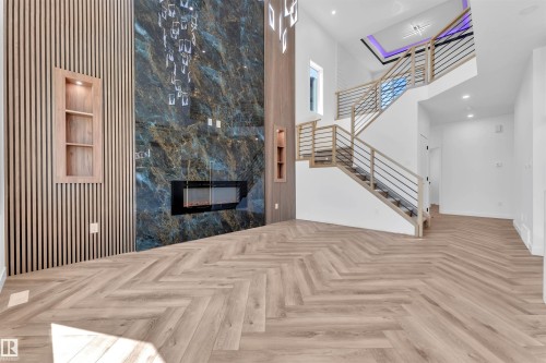 123 Lilac Close, Leduc, AB - Indoor Photo Showing Other Room With Fireplace