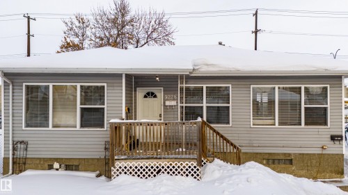 View of front of home with a deck and crawl space - 9228 124A Avenue, Edmonton, AB - Outdoor