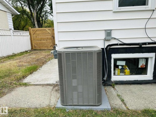 Exterior view of a central air condition unit - 12005 40 St, Edmonton, AB - Outdoor With Exterior