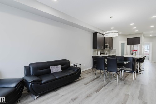 Living area with recessed lighting and light wood finished floors - 343 Edgemont Drive, Edmonton, AB - Indoor
