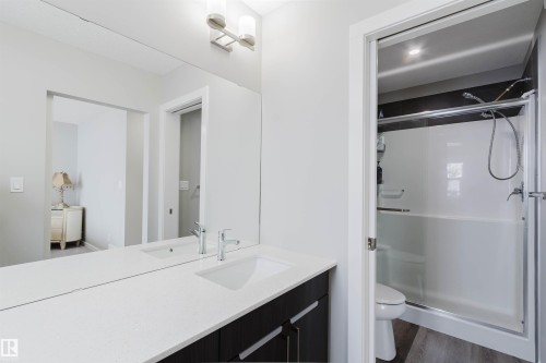 Full bathroom with vanity, a stall shower, and dark wood finished floors - 343 Edgemont Drive, Edmonton, AB - Indoor Photo Showing Bathroom