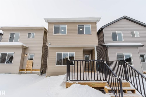 View of front of house featuring a wooden deck - 343 Edgemont Drive, Edmonton, AB - Outdoor