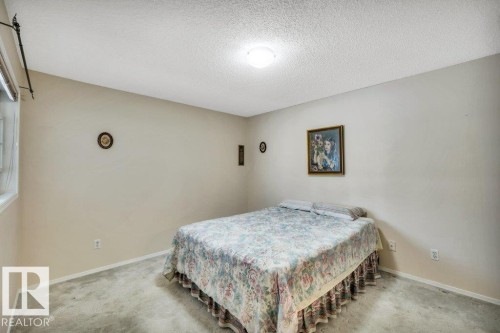 8146 27 Avenue, Edmonton, AB - Indoor Photo Showing Bedroom