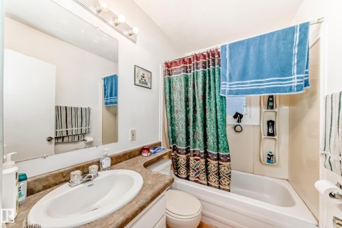 Full bath featuring vanity and shower / tub combo - 15515 92A Avenue, Edmonton, AB - Indoor Photo Showing Bathroom