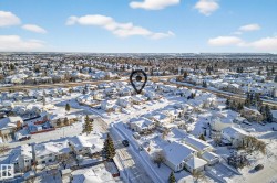 Snowy aerial view with a residential view - 