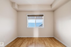 Empty room with light wood-style floors and baseboards - 