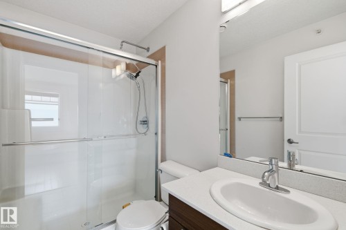 Full bath with vanity and a shower stall - 405 9517 160 Avenue, Edmonton, AB - Indoor Photo Showing Bathroom
