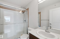 Full bath with vanity and a shower stall - 