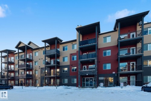 Snow covered property featuring a view of apartment building / complex - 405 9517 160 Avenue, Edmonton, AB - Outdoor With Balcony With Facade