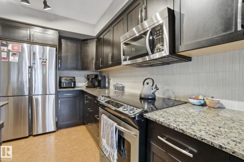 301 9603 98 Avenue, Edmonton, AB - Indoor Photo Showing Kitchen With Upgraded Kitchen