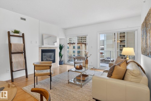 504 11111 82 Avenue Avenue, Edmonton, AB - Indoor Photo Showing Living Room With Fireplace