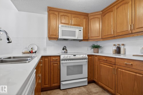 504 11111 82 Avenue Avenue, Edmonton, AB - Indoor Photo Showing Kitchen With Double Sink