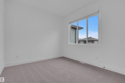 3513 42 Avenue, Beaumont, AB - Indoor Photo Showing Other Room