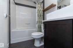 Full bath with shower / bath combo with shower curtain and toilet - 