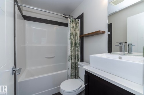 Full bath with vanity and shower / bath combo - 1201 10238 103 Street, Edmonton, AB - Indoor Photo Showing Bathroom