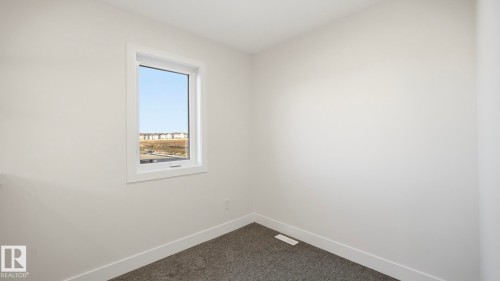 108 Spring Link, Spruce Grove, AB - Indoor Photo Showing Other Room