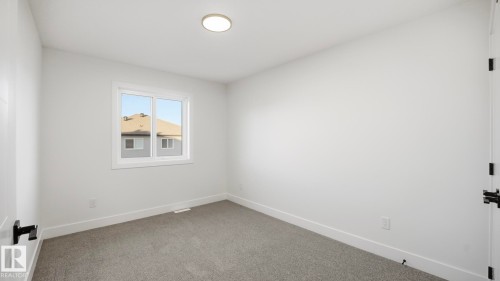 108 Spring Link, Spruce Grove, AB - Indoor Photo Showing Other Room