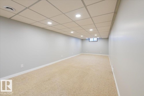 Basement featuring recessed lighting, carpet flooring, and a drop ceiling - 17808 76 Avenue, Edmonton, AB - Indoor