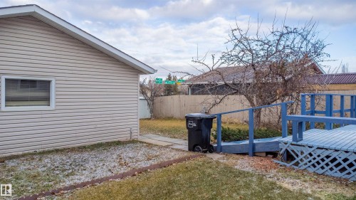 View of yard with a deck - 17808 76 Avenue, Edmonton, AB - Outdoor With Exterior