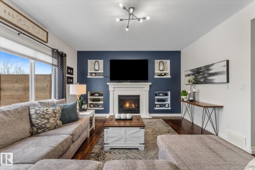 13 Heron Link, Spruce Grove, AB - Indoor Photo Showing Living Room With Fireplace