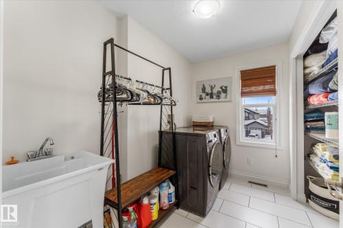 13 Heron Link, Spruce Grove, AB - Indoor Photo Showing Laundry Room